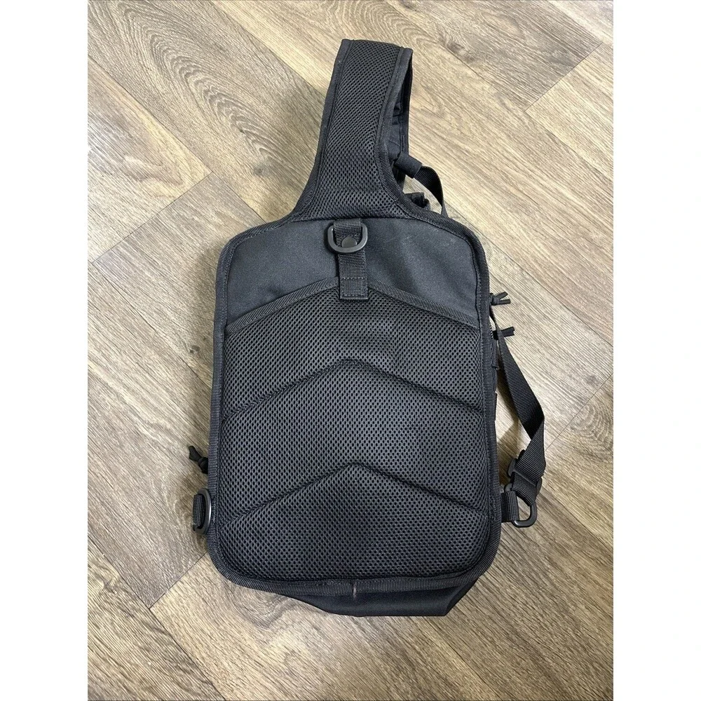 YUKON OUTFITTERS Men's Black Sling Bag Hiking Scouting Multiple Pockets Backpack